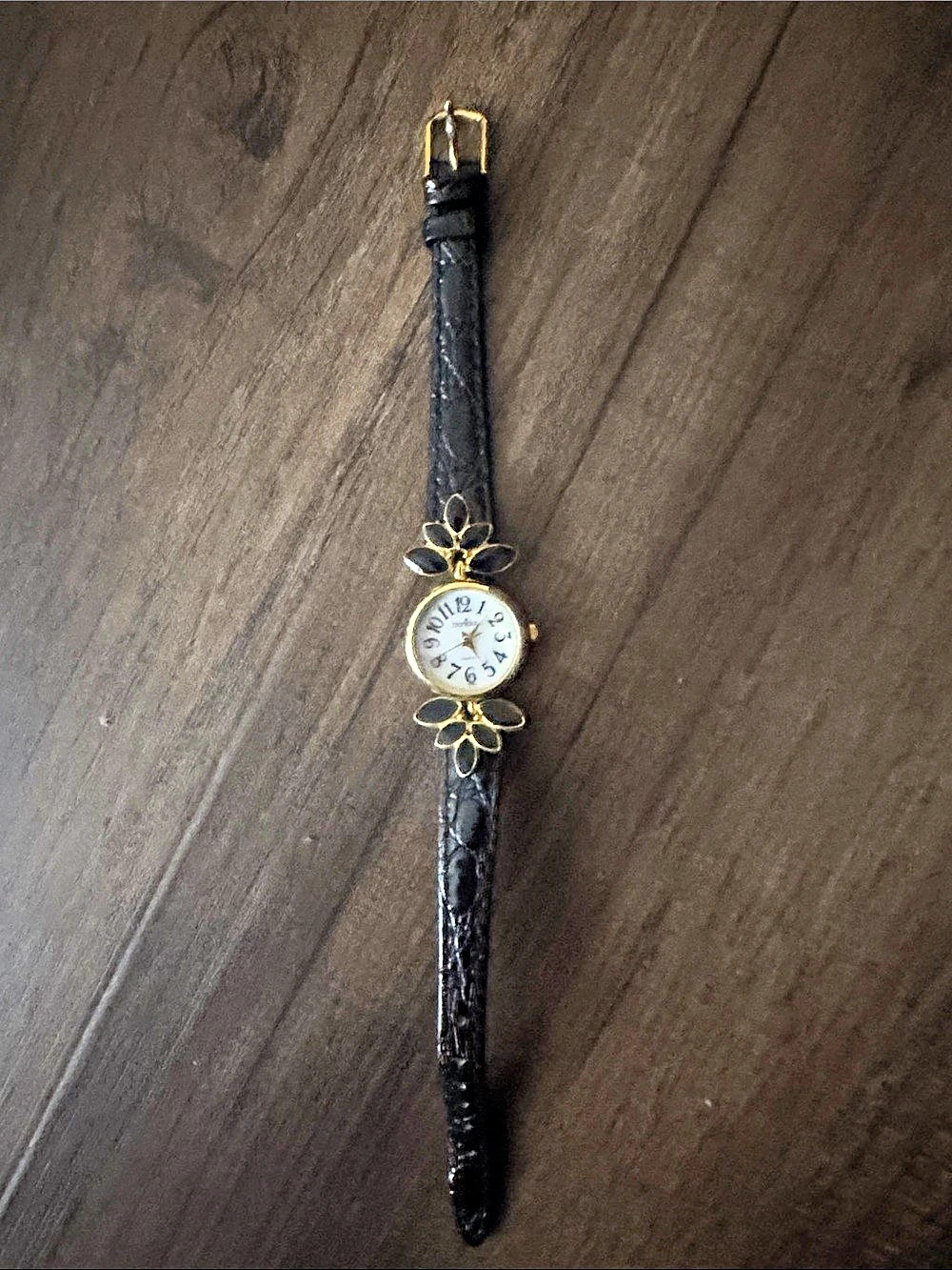bebe Floral Bracelet Watch in Black & Gold Like New